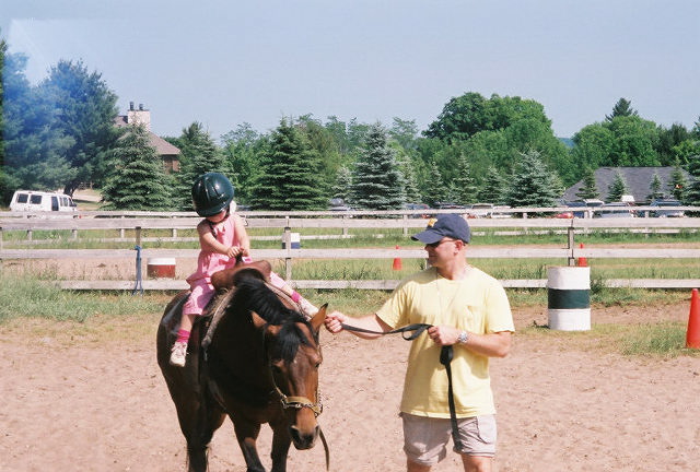 Having fun on the horse.