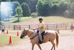 Daddy on the fattest horse at Camp Michigania.